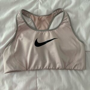 light pink Nike sports bra.